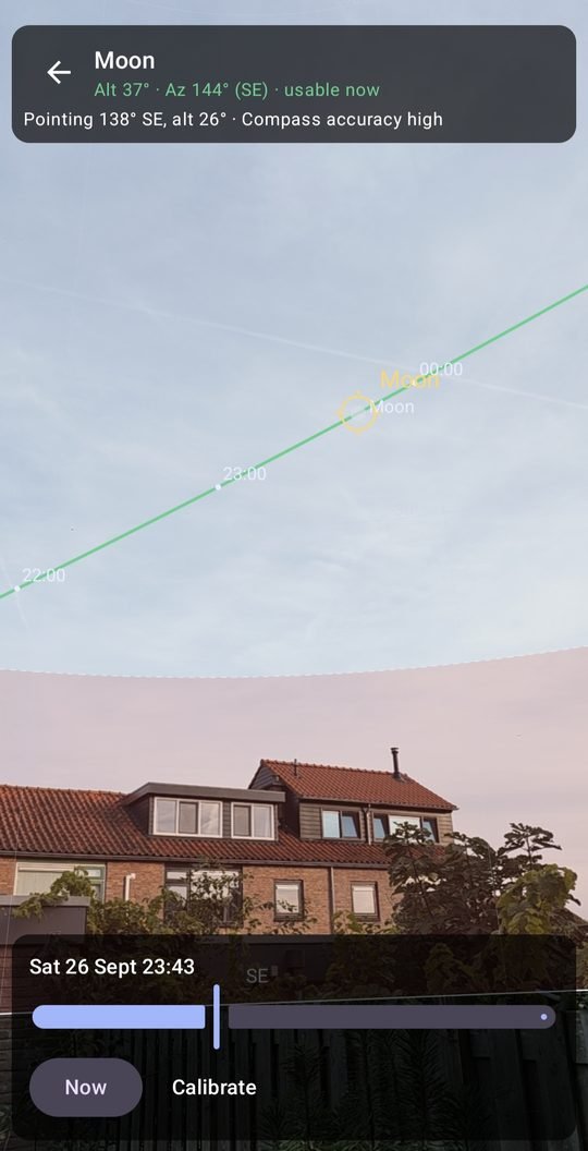 AR view: the Moon's path over the rooftops with hour ticks